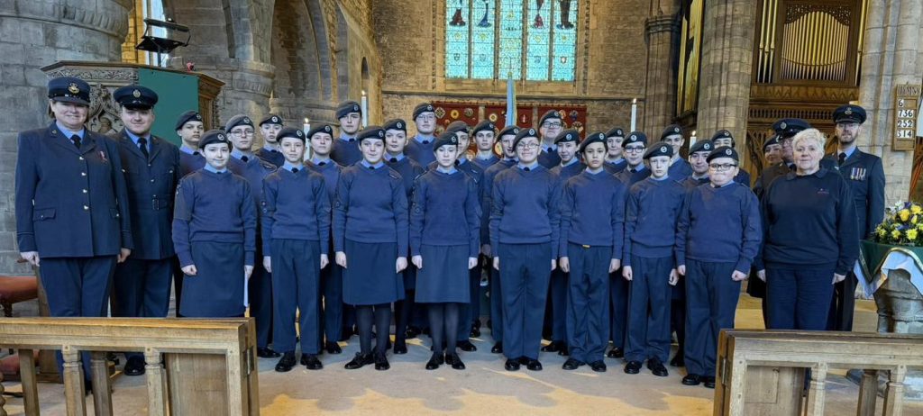 Cadets and volunteers celebrating the 85th anniversary of the Air Training Corps.